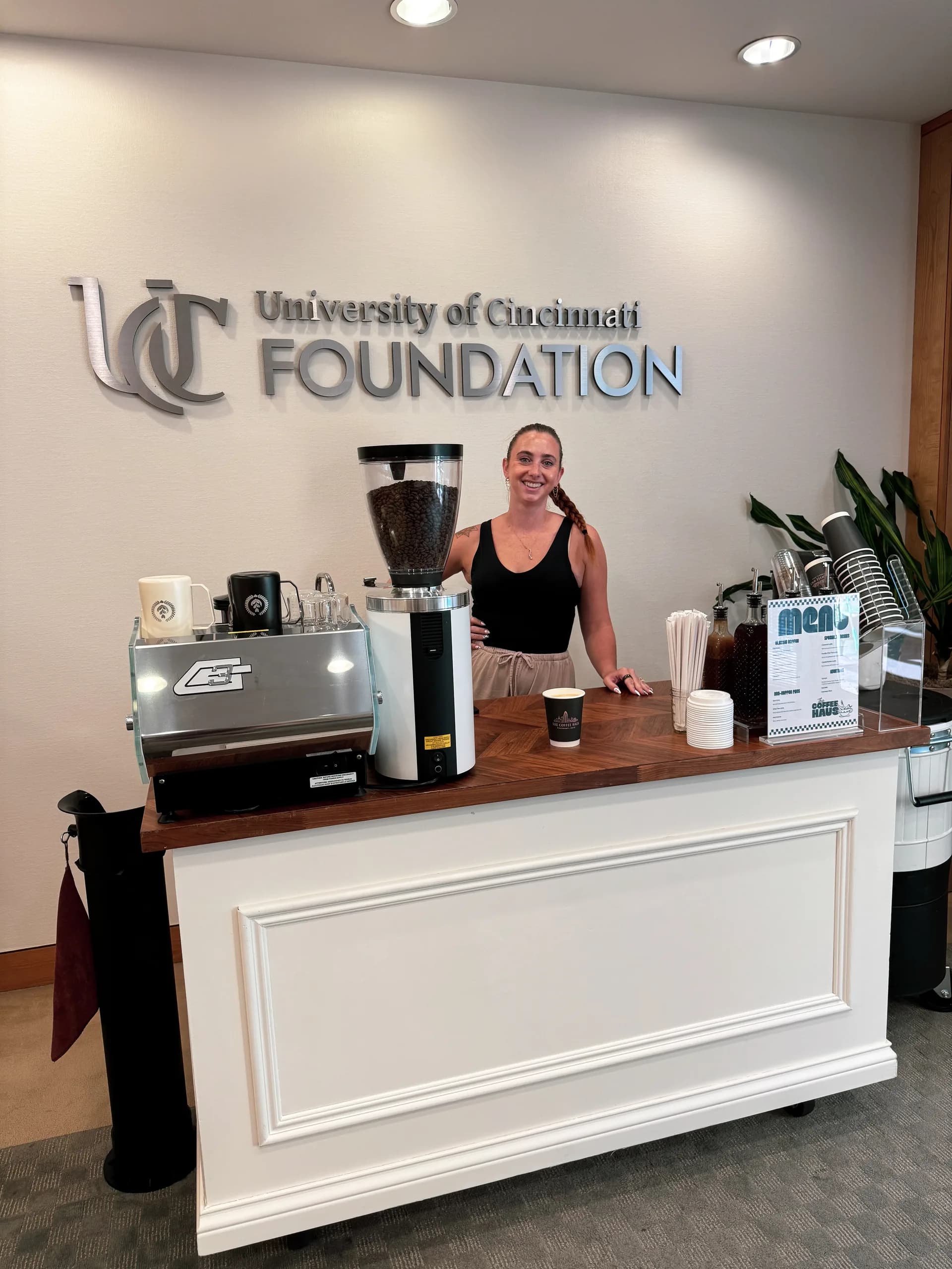 A Coffee Haus barista behind the mobile espresso bar at the University of Cincinnati Foundation in Cincinnati, Ohio